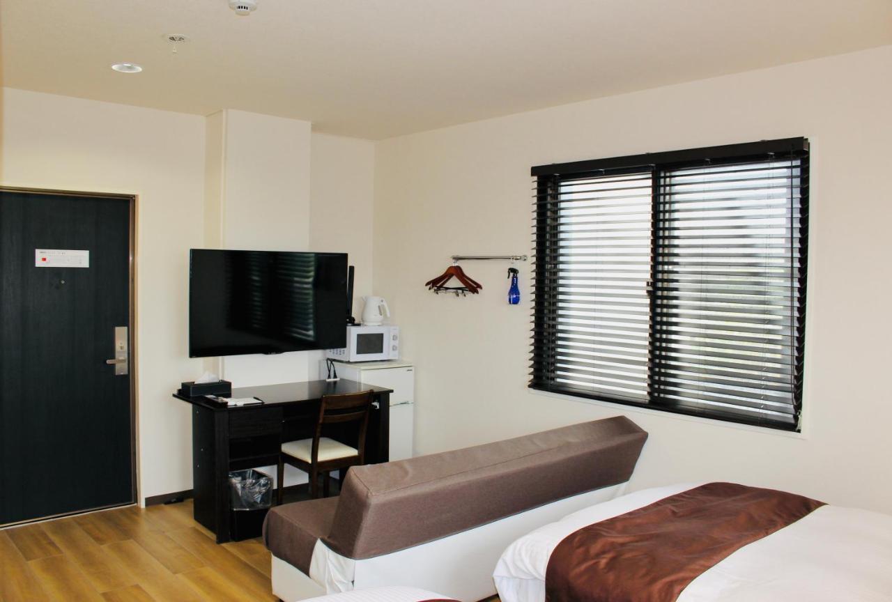 Phoenix Park Hotel Nago Exterior foto